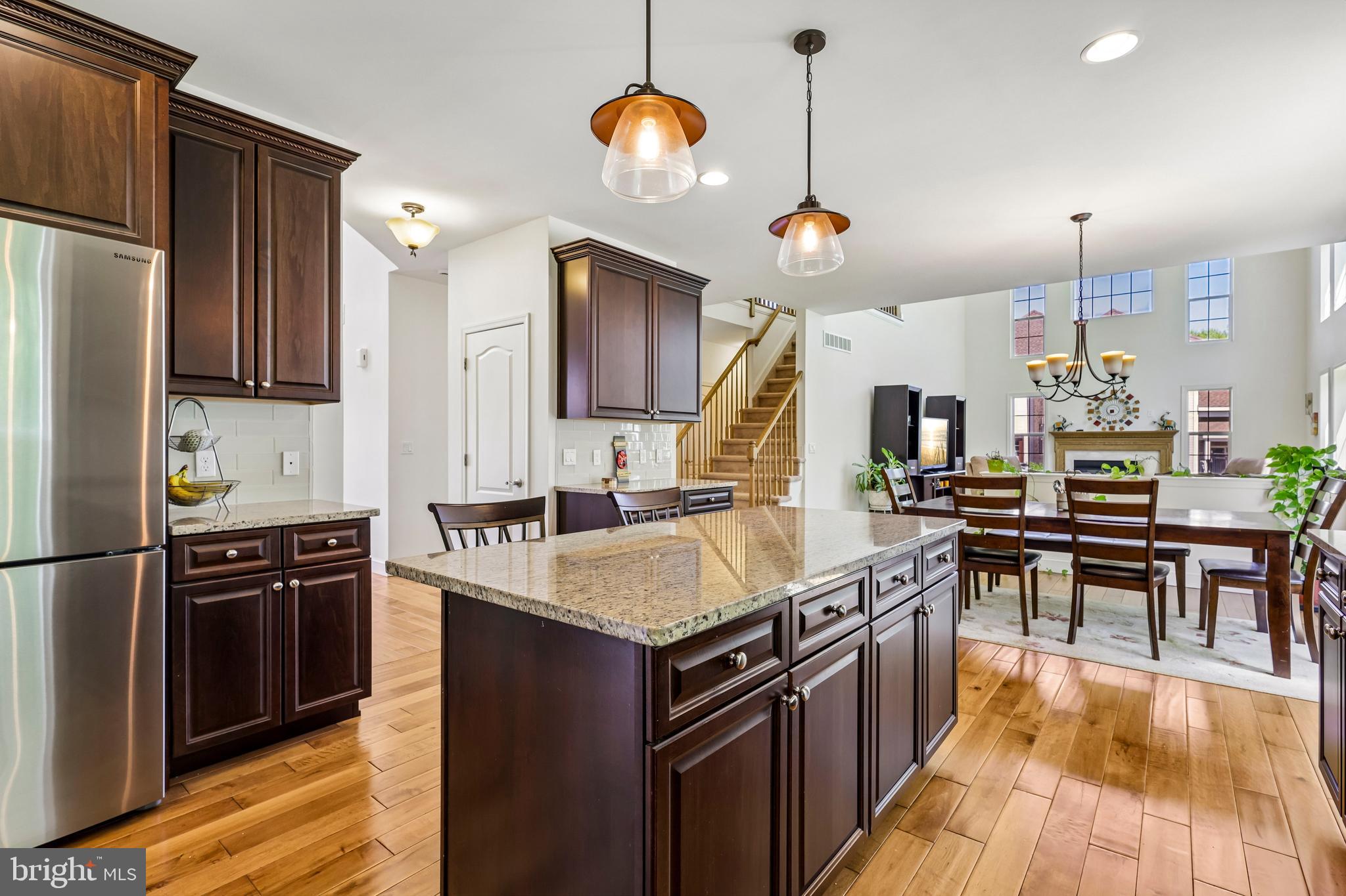 41 Emerald Road Robbinsville, NJ 08691 - Photo 13 of 69 a kitchen with stainless steel appliances granite countertop a stove top oven a refrigerator a sink and dishwasher
