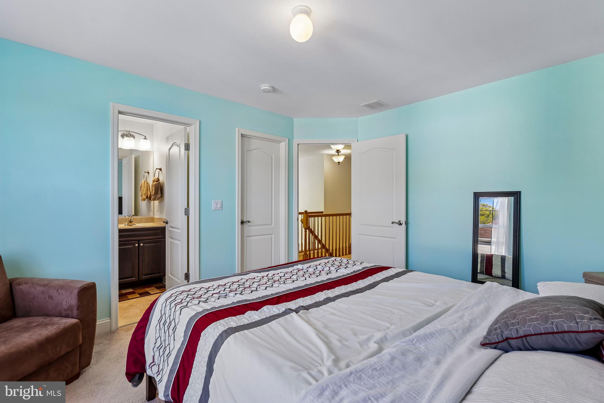 41 Emerald Road Robbinsville, NJ 08691 - Photo 41 of 69 a bedroom with a bed and a couch