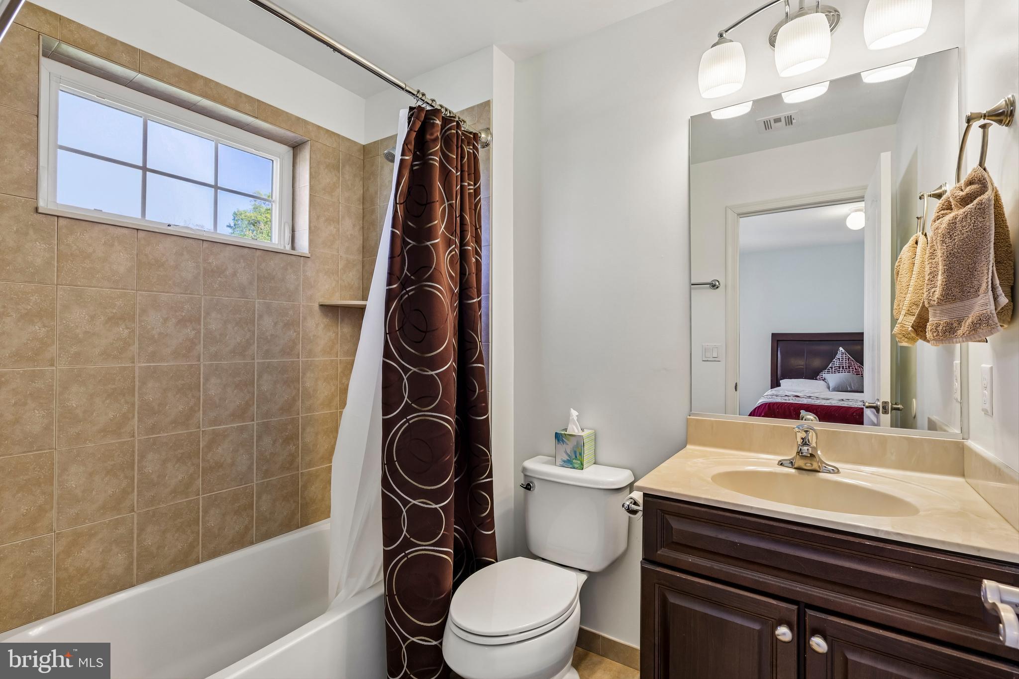 41 Emerald Road Robbinsville, NJ 08691 - Photo 42 of 69 a bathroom with a sink a toilet and shower