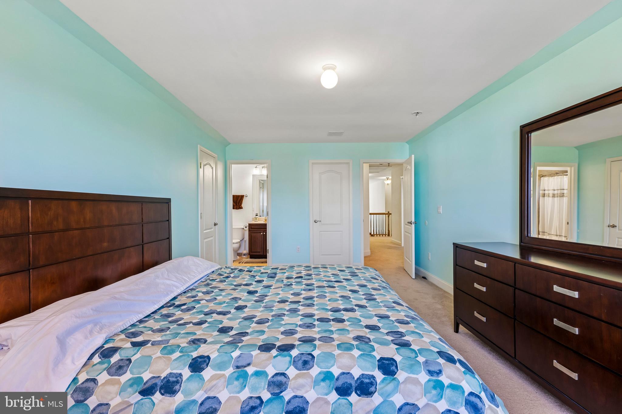41 Emerald Road Robbinsville, NJ 08691 - Photo 44 of 69 a bedroom with a large bed and a dresser