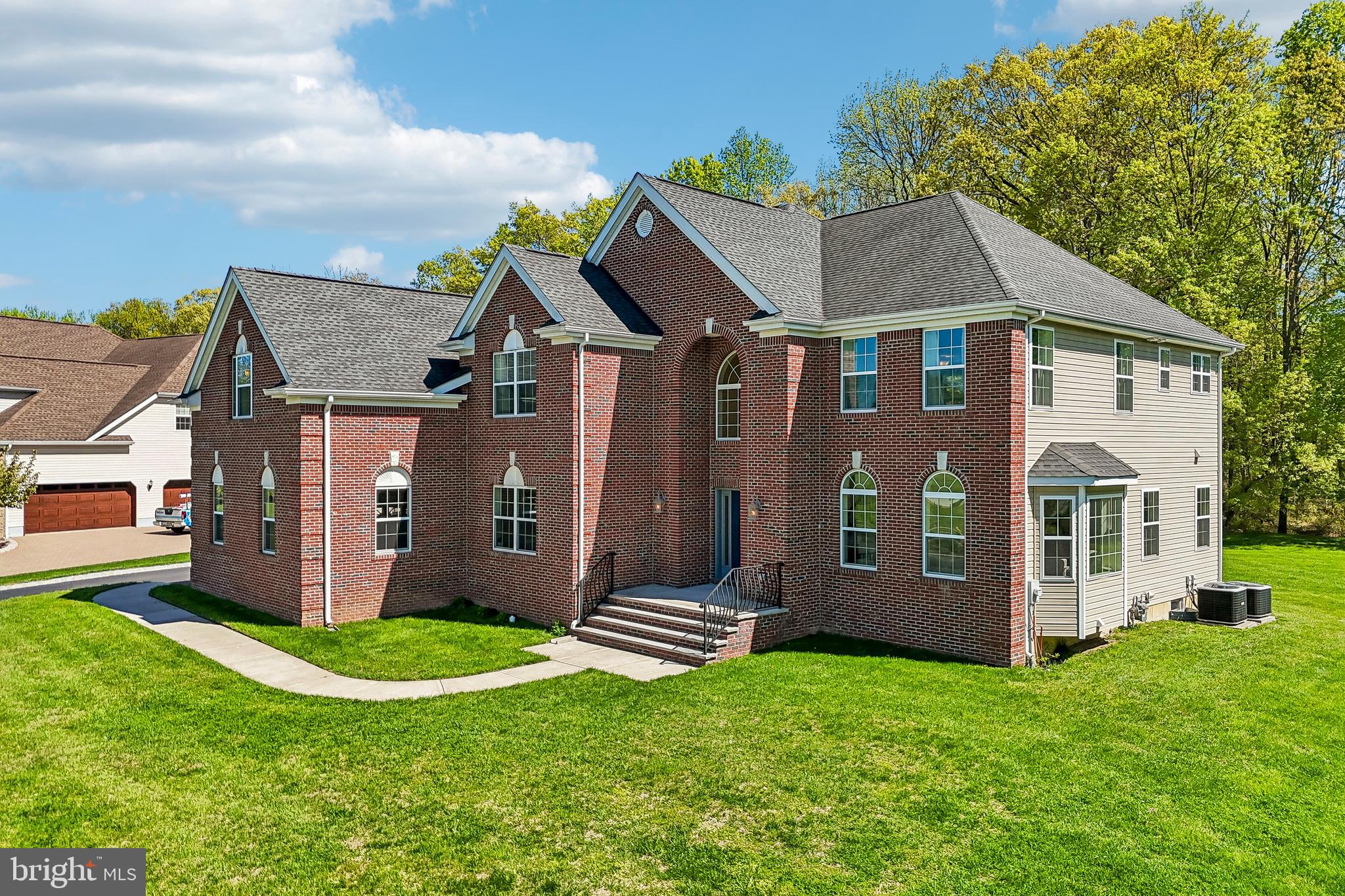 41 Emerald Road Robbinsville, NJ 08691 - Photo 63 of 69 a front view of a house with a garden