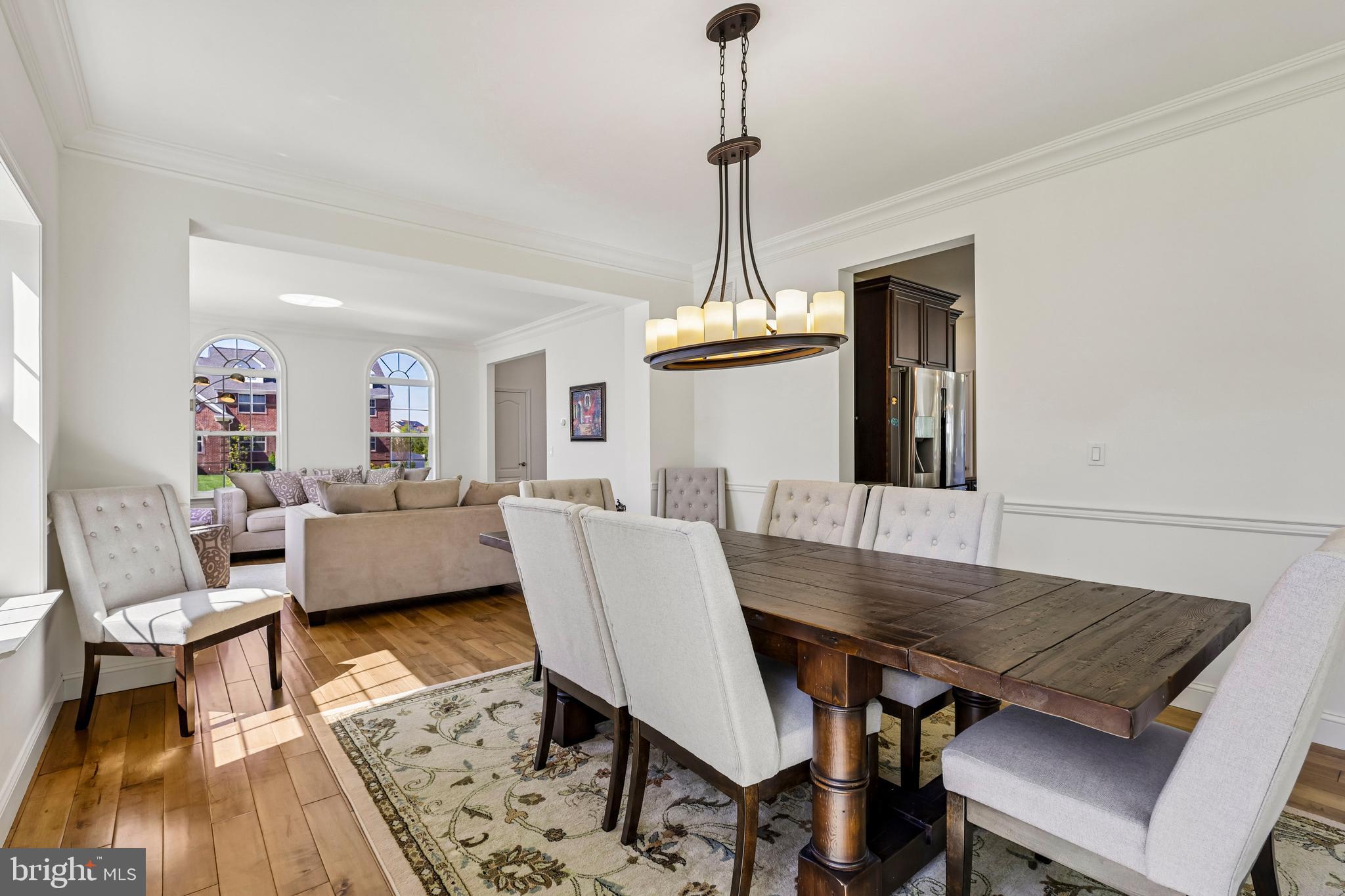 41 Emerald Road Robbinsville, NJ 08691 - Photo 10 of 69 a view of a dining room with furniture and wooden floor