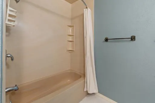 a bathroom with a bathtub