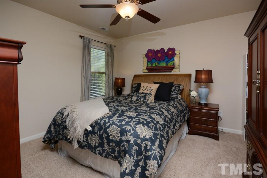 1003 Lakeview Road Durham, NC 27712 - Photo 17 of 25 a bedroom with bed and window