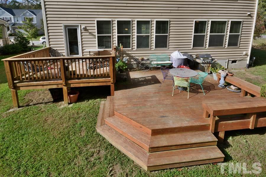 1003 Lakeview Road Durham, NC 27712 - Photo 3 of 25 a view of a chairs setting on the roof deck