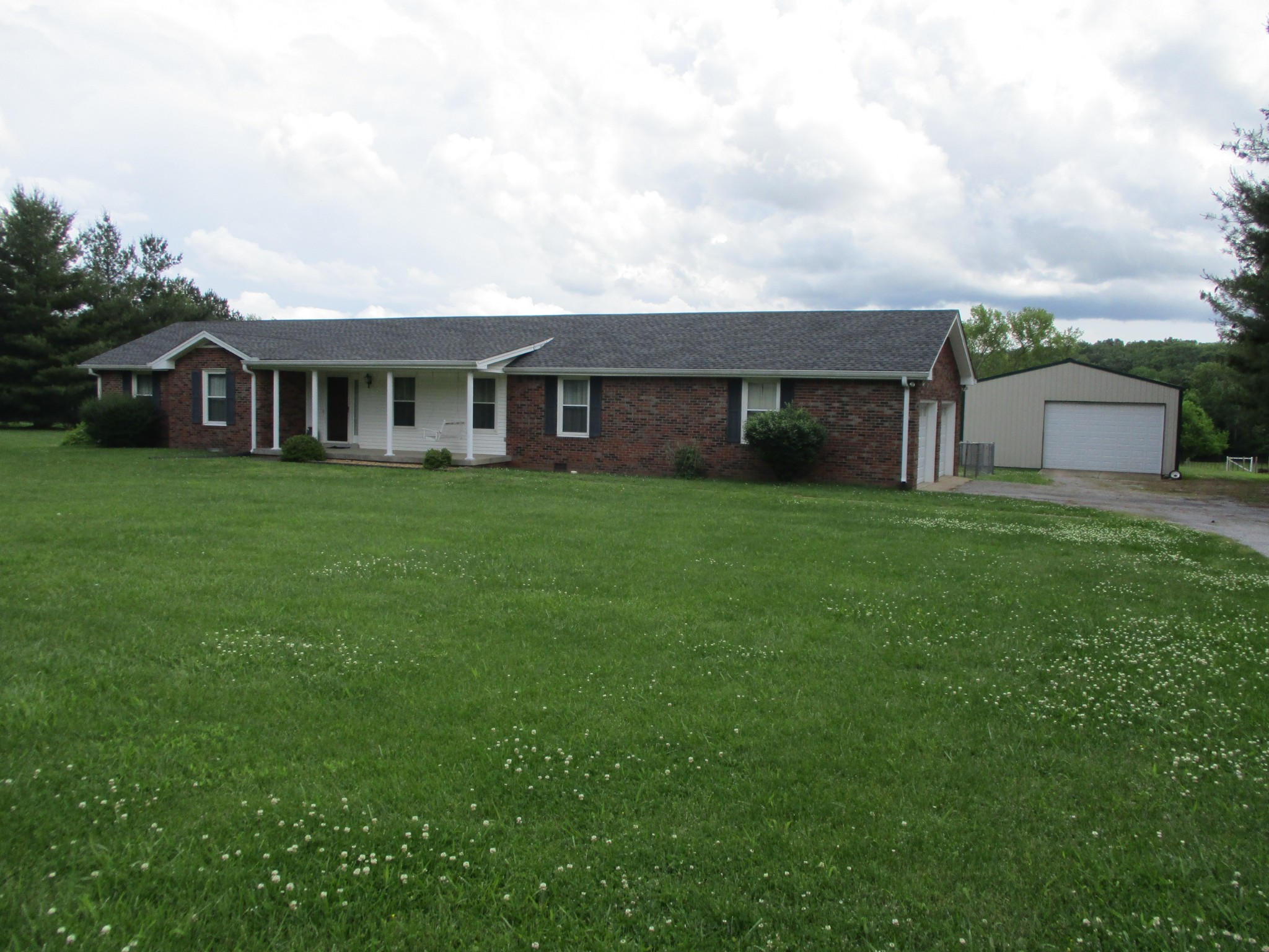 6206 Hickory Ridge Road Lebanon, TN 37090 - Photo 1 of 28 front view of a house with a yard