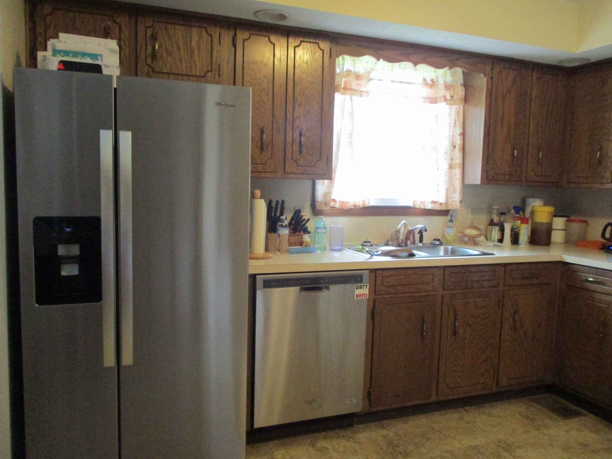 6206 Hickory Ridge Road Lebanon, TN 37090 - Photo 13 of 28 a kitchen with stainless steel appliances granite countertop a refrigerator and a sink