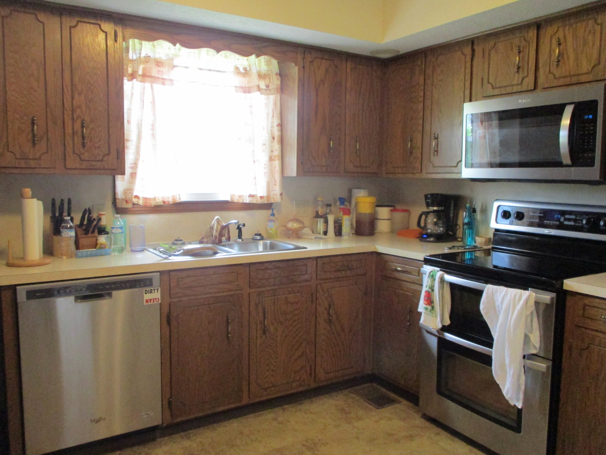 6206 Hickory Ridge Road Lebanon, TN 37090 - Photo 14 of 28 a kitchen with stainless steel appliances a stove a sink and a microwave