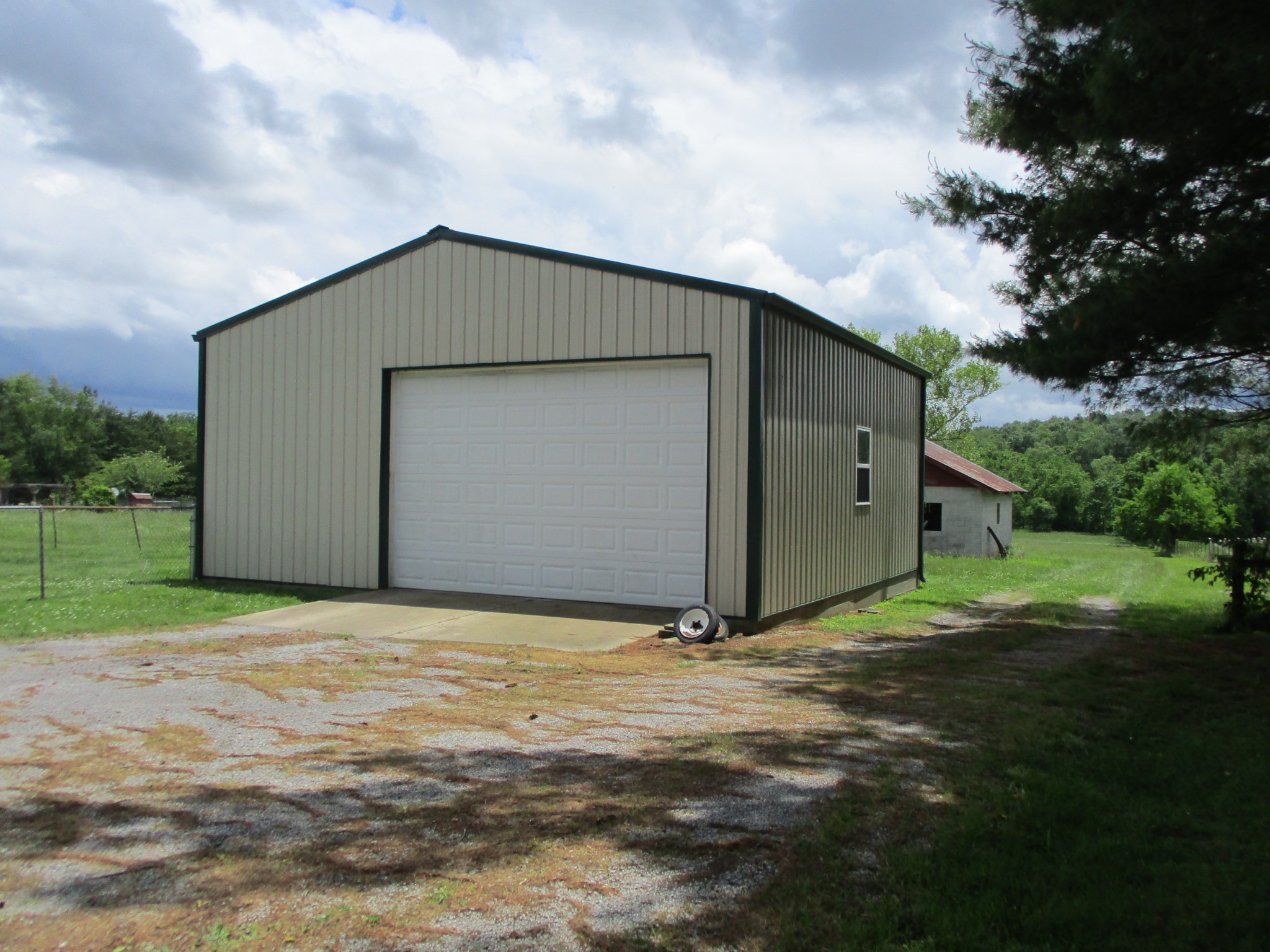 6206 Hickory Ridge Road Lebanon, TN 37090 - Photo 5 of 28 a view of a house with backyard and garden