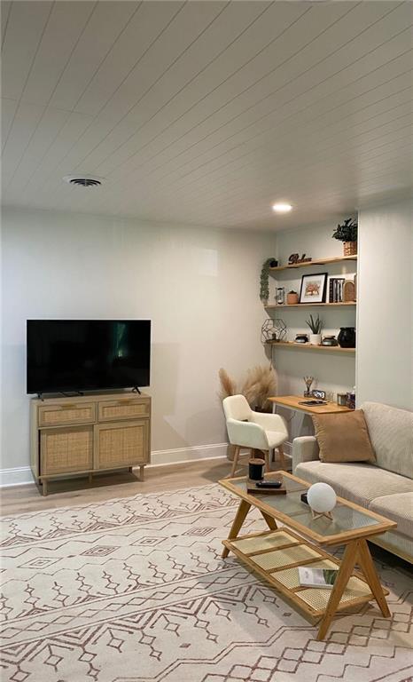 330 Ivy Trail Hartwell, GA 30643 - Photo 24 of 34 a living room with furniture and a flat screen tv