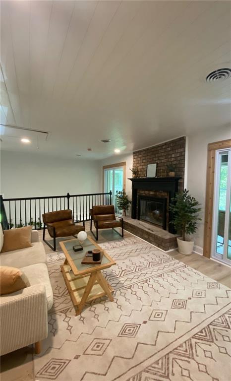 330 Ivy Trail Hartwell, GA 30643 - Photo 26 of 34 a living room with furniture a flat screen tv and a fireplace