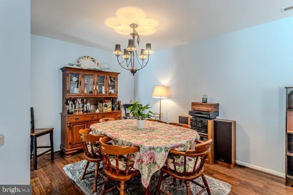 a table and chairs in a room