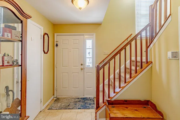 a view of an entryway with staircase