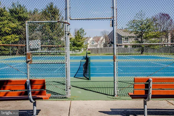 a view of a wooden fence