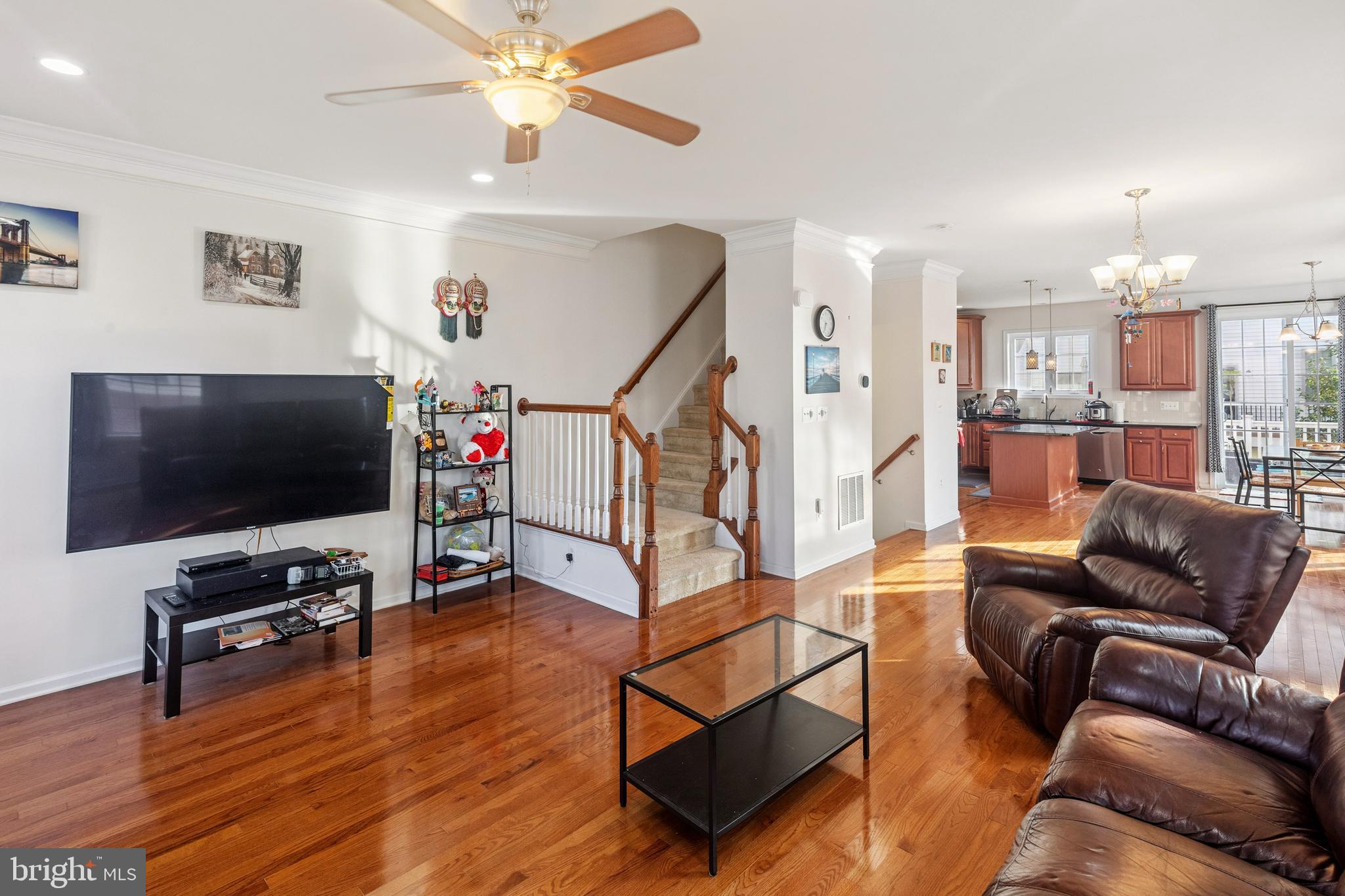 22551 Cambridgeport Square Ashburn, VA 20148 - Photo 13 of 49 a living room with furniture and a flat screen tv