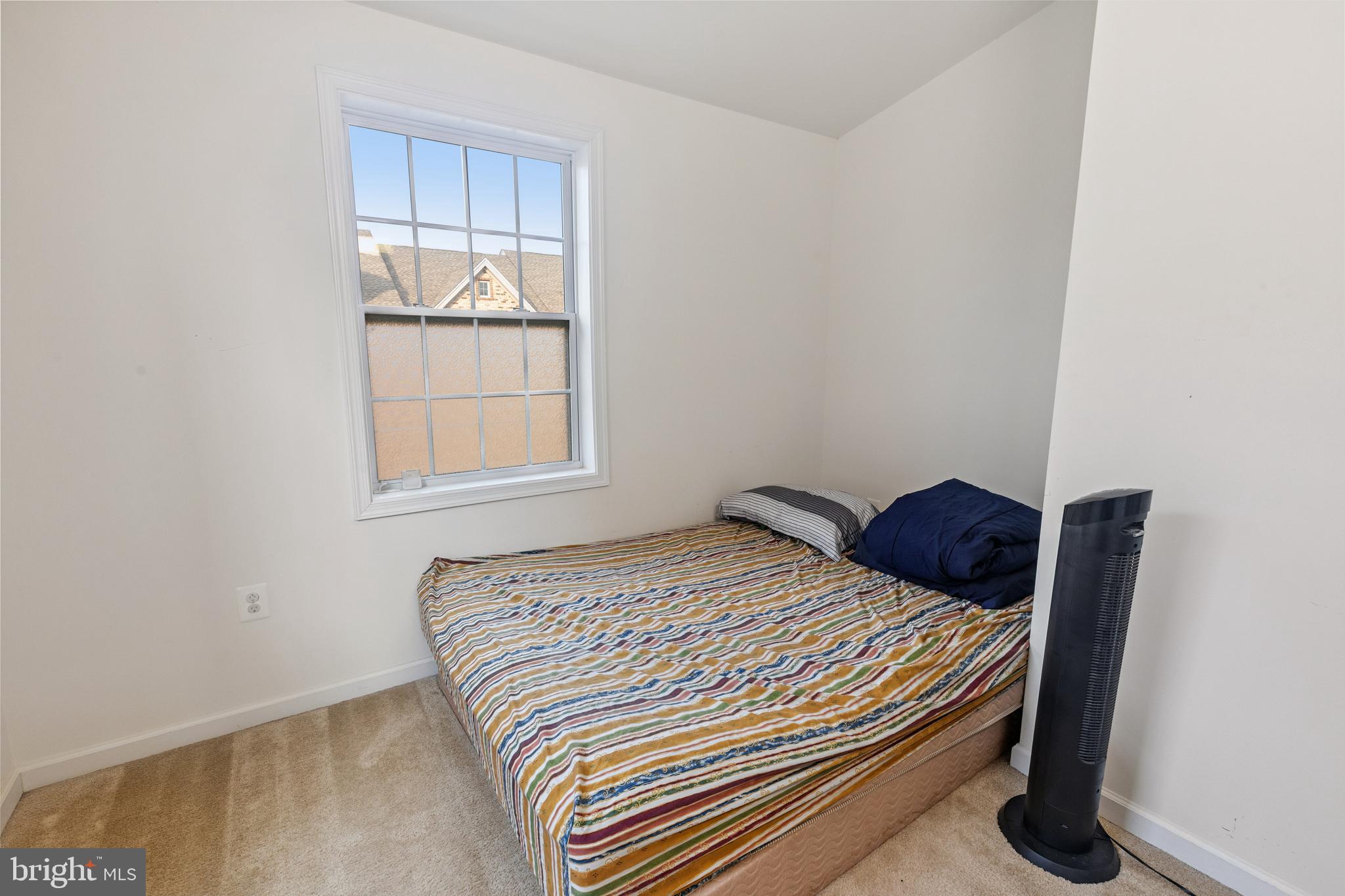 22551 Cambridgeport Square Ashburn, VA 20148 - Photo 25 of 49 a bedroom with a bed and window