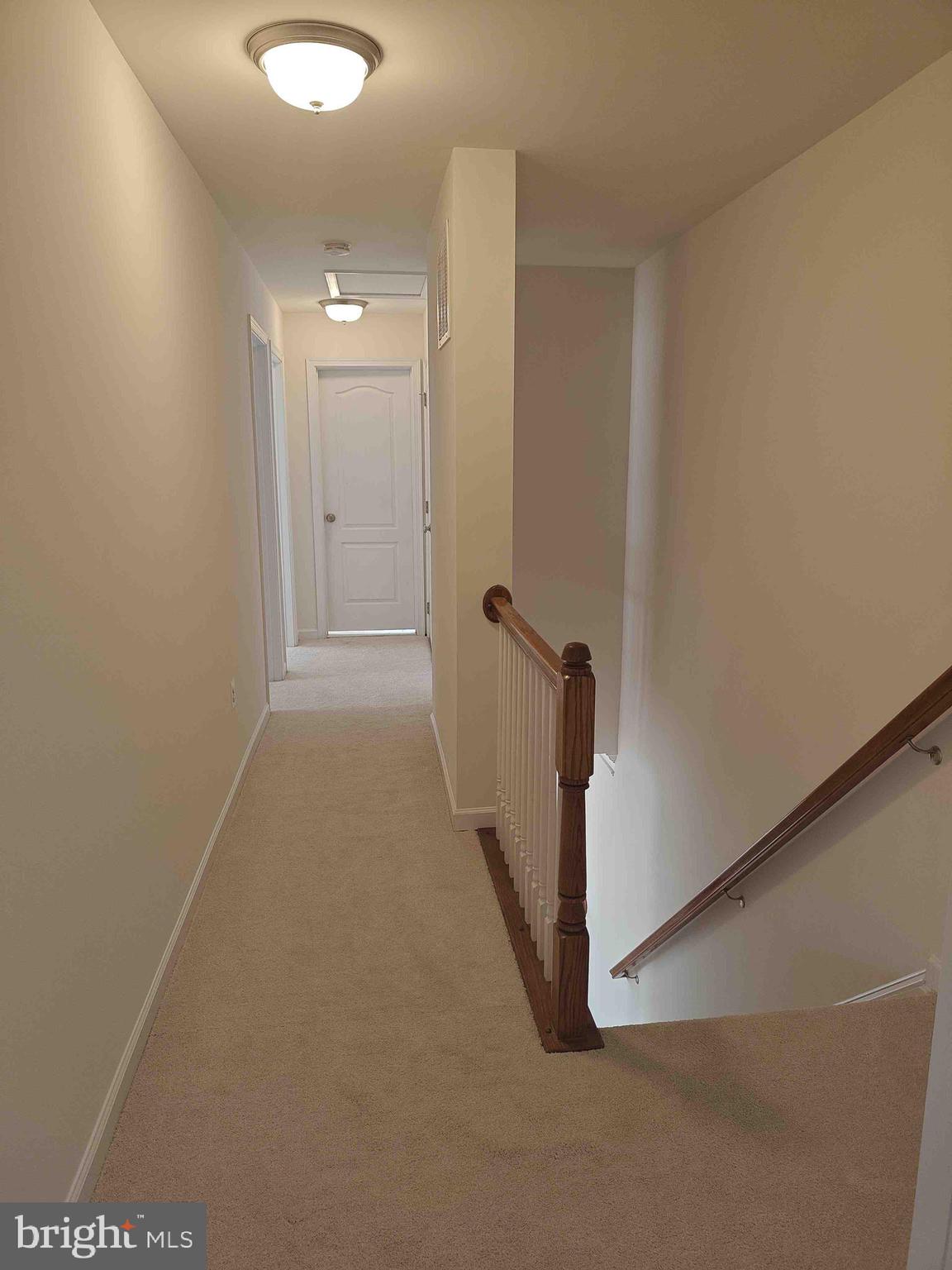 22551 Cambridgeport Square Ashburn, VA 20148 - Photo 31 of 49 a view of a hallway with closet