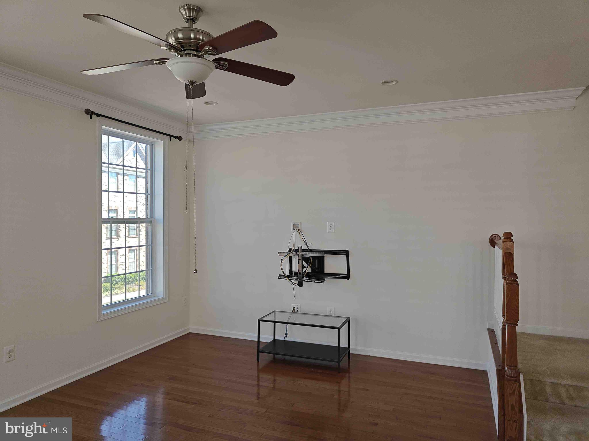 22551 Cambridgeport Square Ashburn, VA 20148 - Photo 42 of 49 a bedroom with furniture window and wooden floor