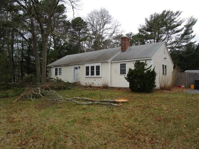 206 Cedric Road Centerville, MA 02632 - Photo 2 of 3 a view of house with outdoor space and garden