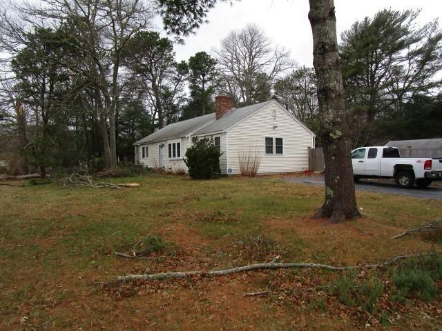 206 Cedric Road Centerville, MA 02632 - Photo 3 of 3 a house view with a garden space
