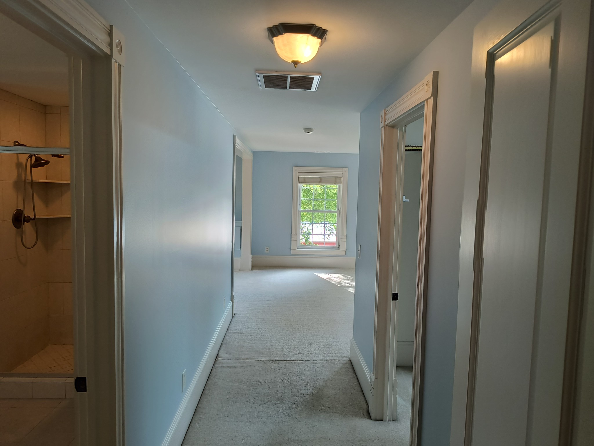 3460 Big Springs Road Lebanon, TN 37090 - Photo 56 of 74 a view of a hallway with wooden floor and a chandelier