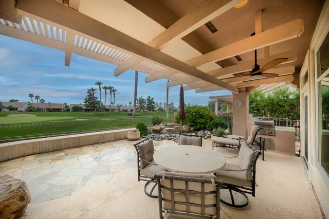 a view of a golf course with a lake