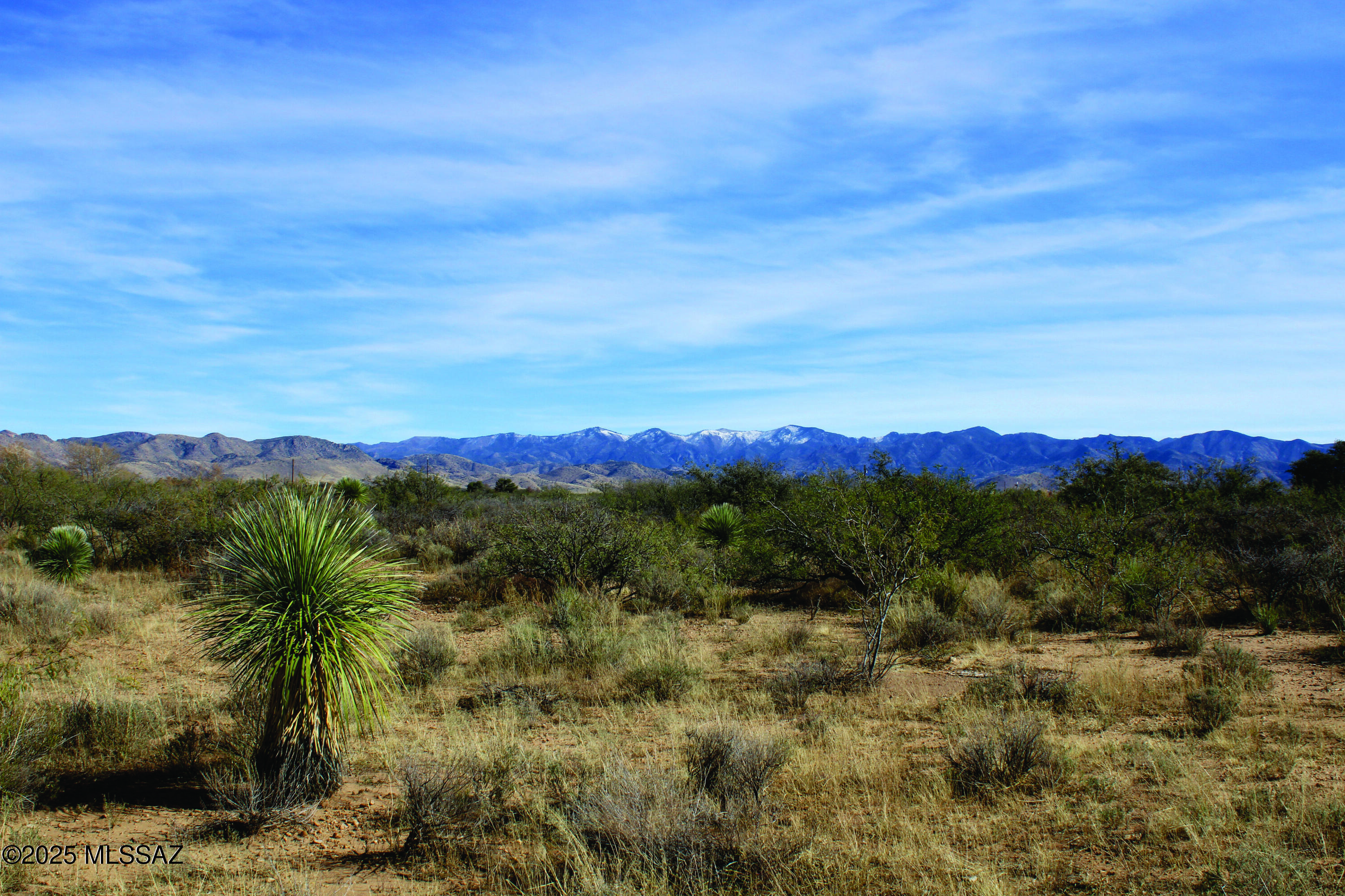 10-acres East Roadrunner Road, Unit D Pearce, AZ 85625 - Photo 16 of 24 a view of mountain with sunset in background