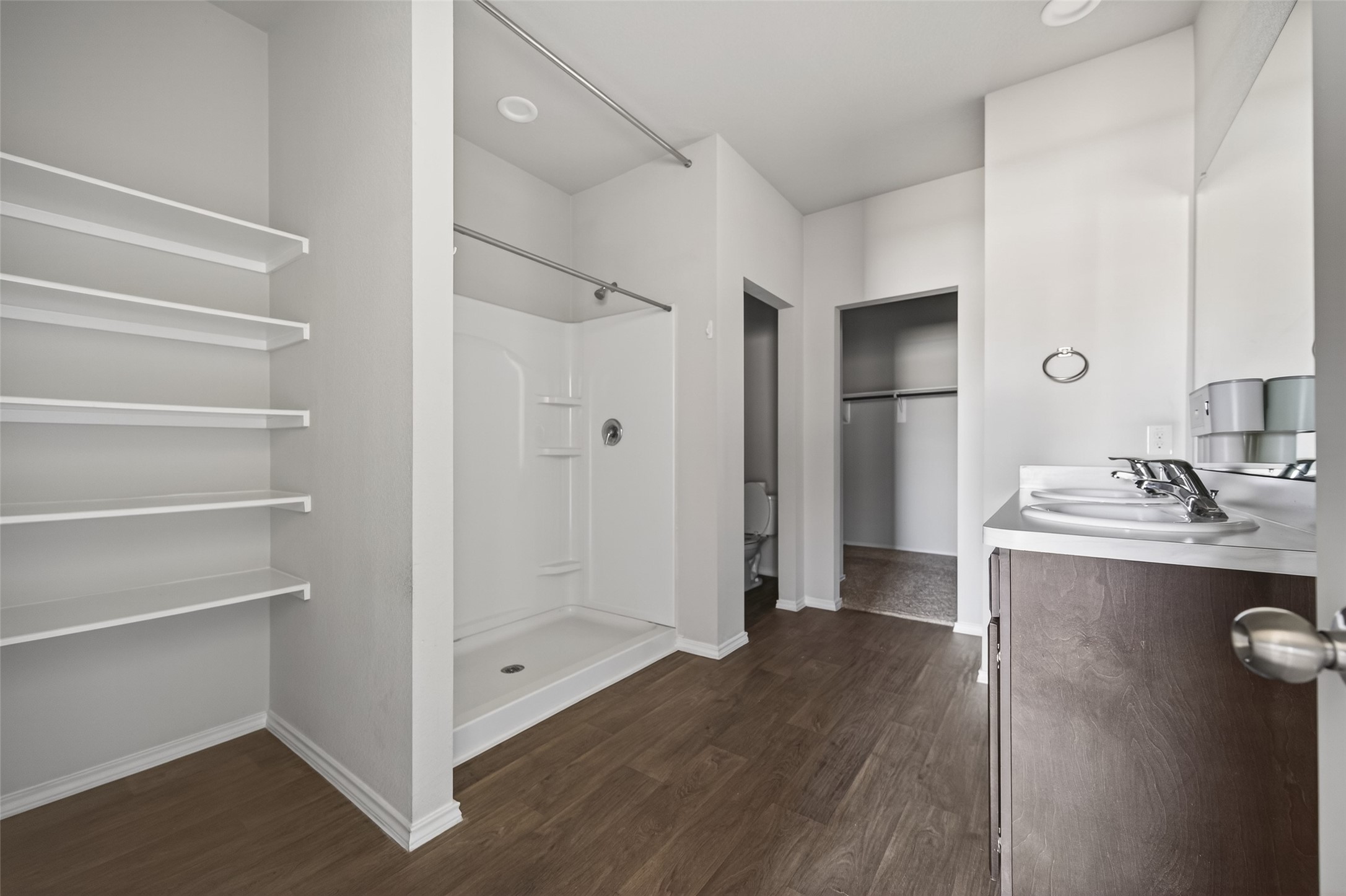 14432 Sugar Pines Drive Conroe, TX 77302 - Photo 15 of 26 a view of bathroom with a sink mirror and shower