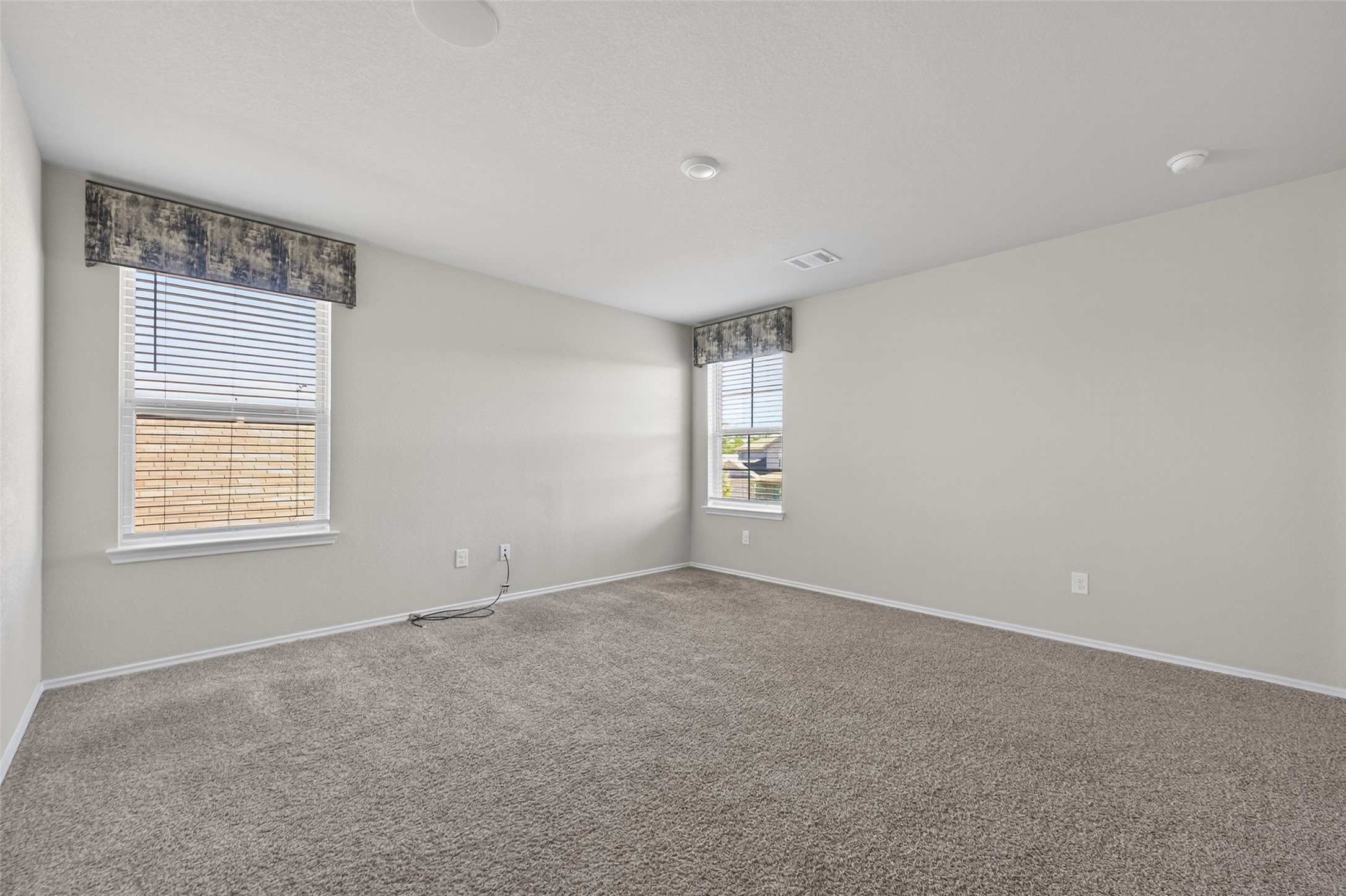 14432 Sugar Pines Drive Conroe, TX 77302 - Photo 17 of 26 a view of an empty room with a window