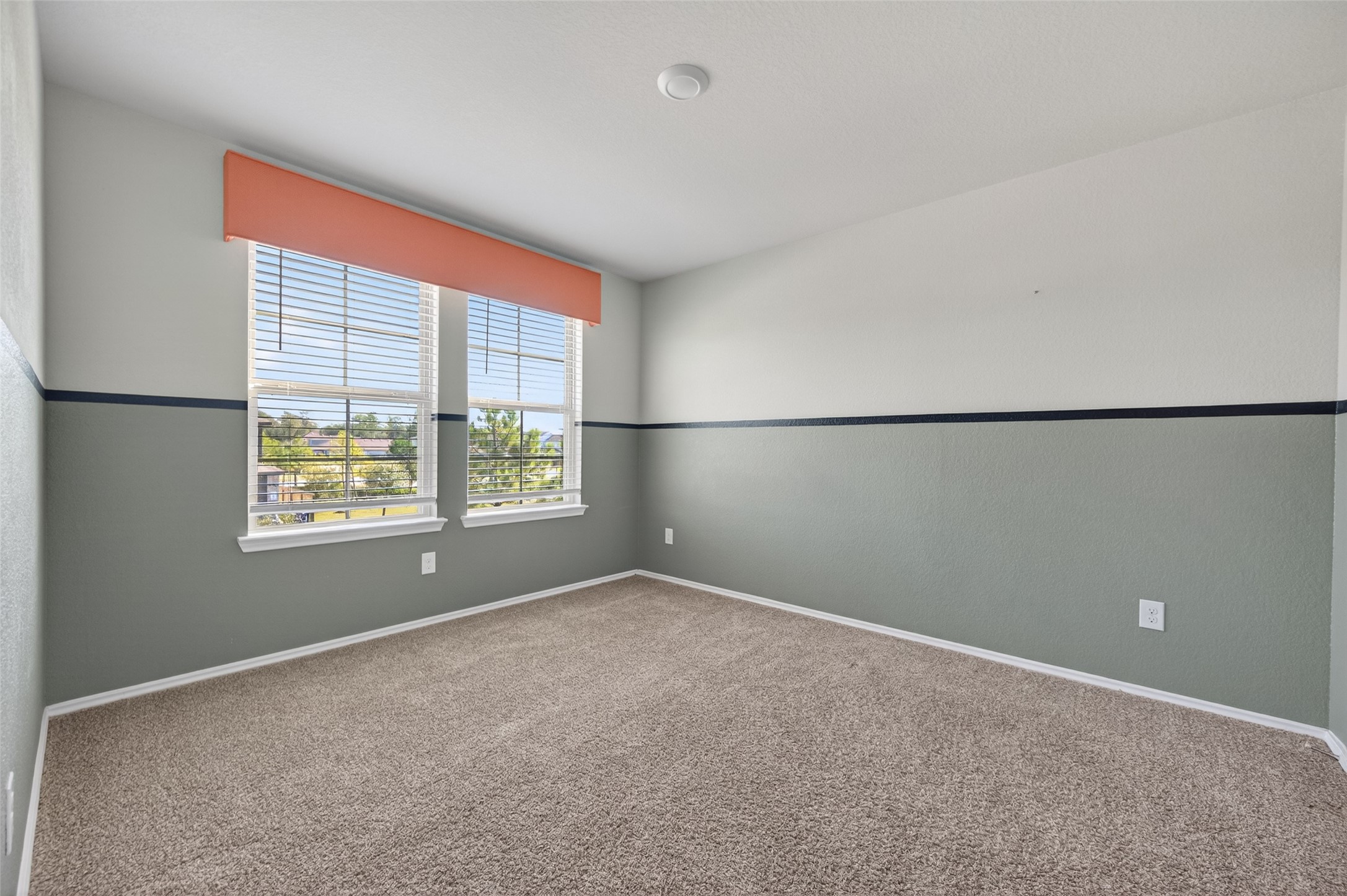 14432 Sugar Pines Drive Conroe, TX 77302 - Photo 21 of 26 a view of an empty room with a window