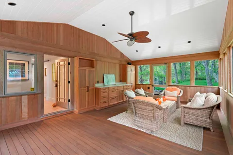 a living room with furniture and a window
