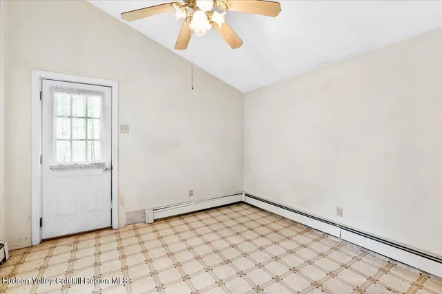 an empty room with windows