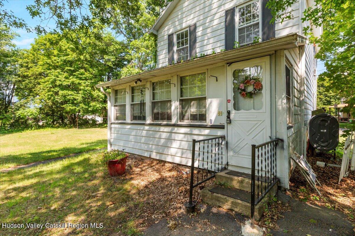 7 Grove Street Cairo, NY 12413 - Photo 22 of 35 a view of a house with backyard and sitting area