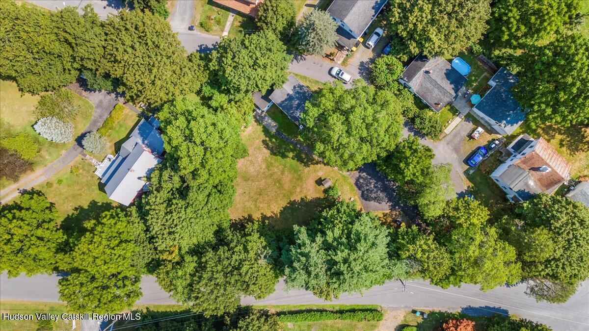 7 Grove Street Cairo, NY 12413 - Photo 26 of 35 an aerial view of residential house with outdoor space and trees all around