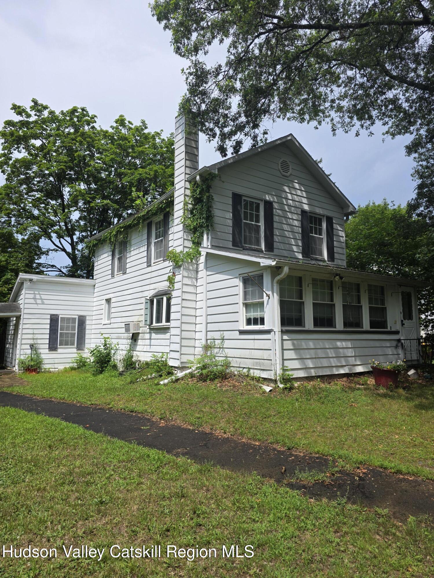 7 Grove Street Cairo, NY 12413 - Photo 29 of 35 a front view of a house with a yard