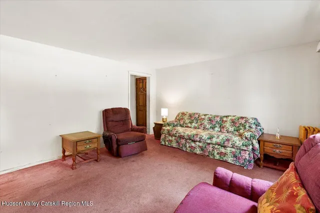 a bedroom with furniture and a couch