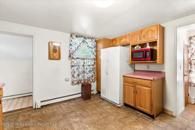 a view of walk in closet with window