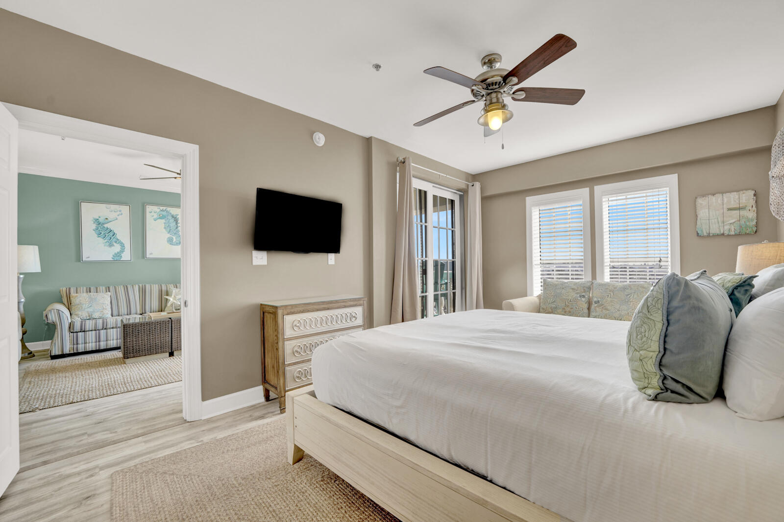 10343 East County Highway 30A, Unit 412B Seacrest, FL 32413 - Photo 11 of 39 a bedroom with a bed window and a flat screen tv