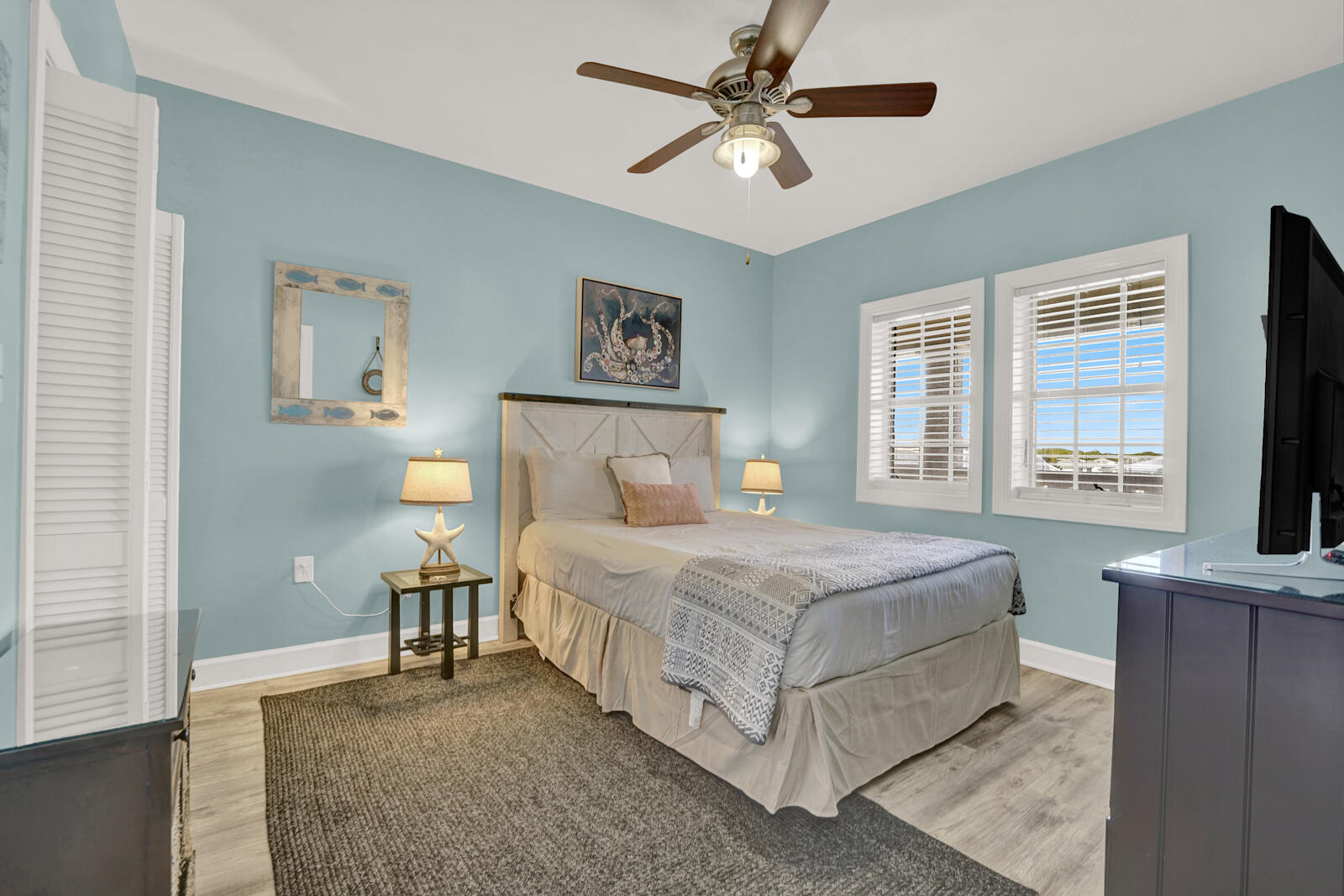 10343 East County Highway 30A, Unit 412B Seacrest, FL 32413 - Photo 18 of 39 a bedroom with a large bed and a window