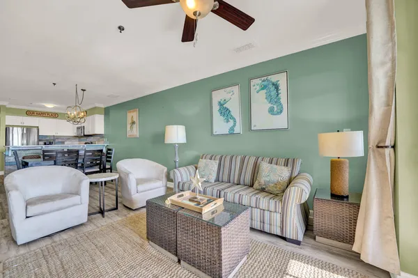 a living room with furniture and a lamp