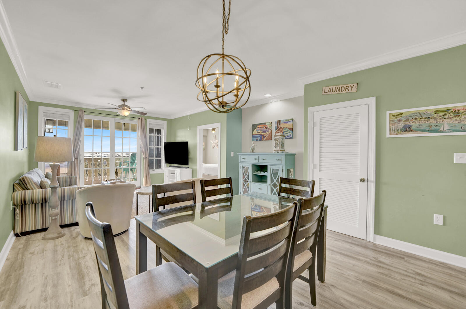 10343 East County Highway 30A, Unit 412B Seacrest, FL 32413 - Photo 7 of 39 a view of a dining room with furniture and a large window