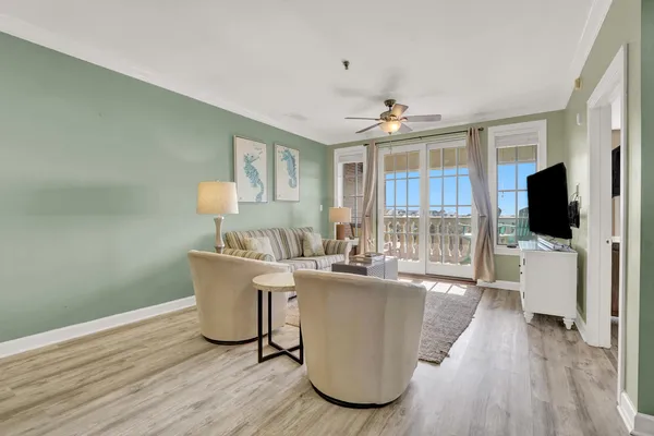 a living room with a couch and a flat screen tv