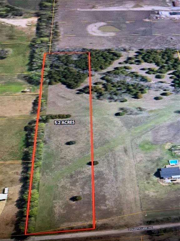 10843 East Line Road Trenton, TX 75490 - Photo 9 of 19 a sign board on the side of a road