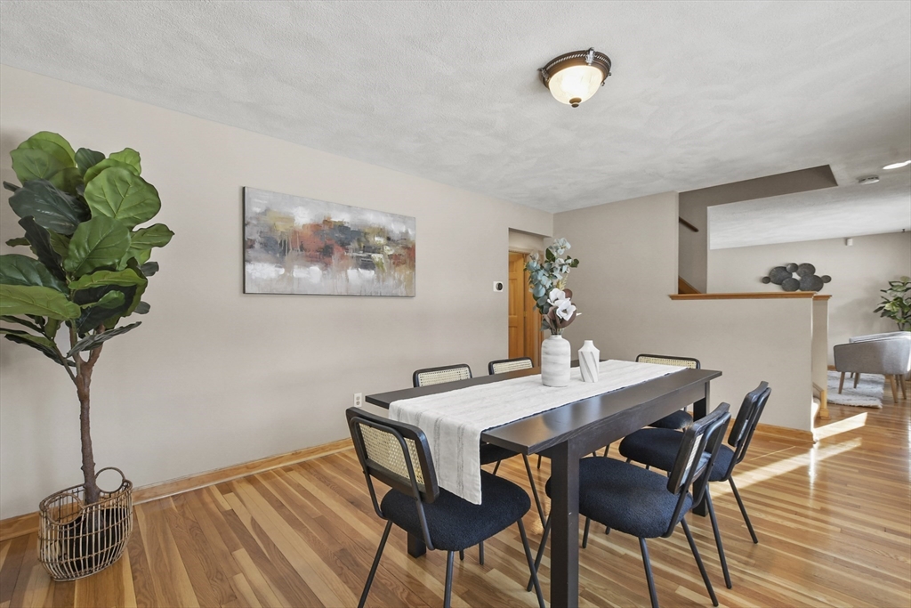 2 Market Street Billerica, MA 01821 - Photo 13 of 34 a view of a dining room with furniture and a potted plant