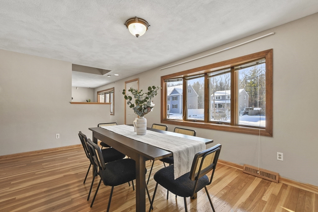 2 Market Street Billerica, MA 01821 - Photo 14 of 34 a view of a dining room with furniture window and wooden floor