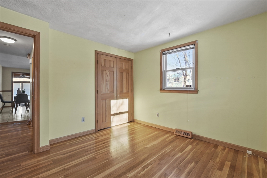 2 Market Street Billerica, MA 01821 - Photo 19 of 34 a view of empty room with wooden floor and fan