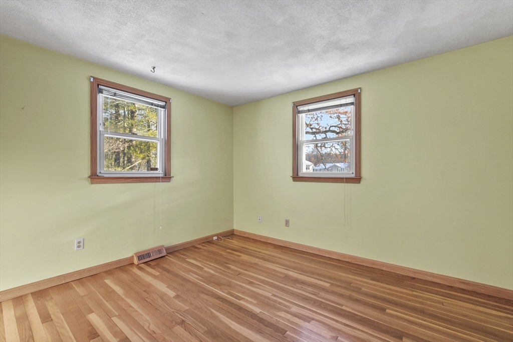 2 Market Street Billerica, MA 01821 - Photo 20 of 34 a view of a room with wooden floor and white walls