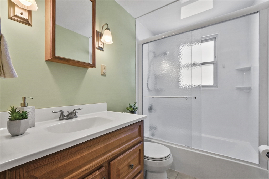 2 Market Street Billerica, MA 01821 - Photo 21 of 34 a bathroom with a sink toilet and shower