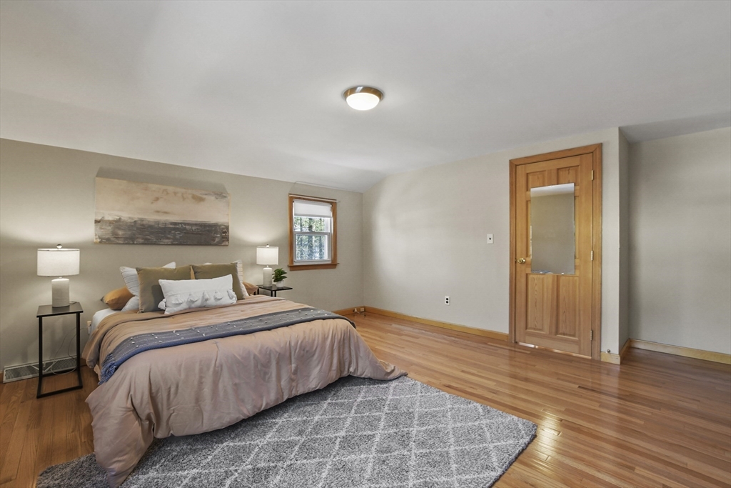 2 Market Street Billerica, MA 01821 - Photo 23 of 34 a bedroom with a bed and a night stand