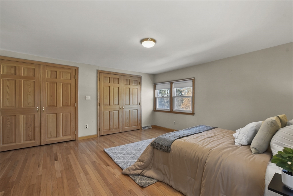 2 Market Street Billerica, MA 01821 - Photo 24 of 34 a bedroom with a bed and a window